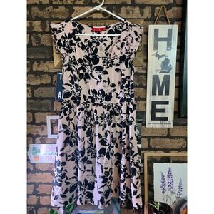 Size medium Elle pink dress with black floral design